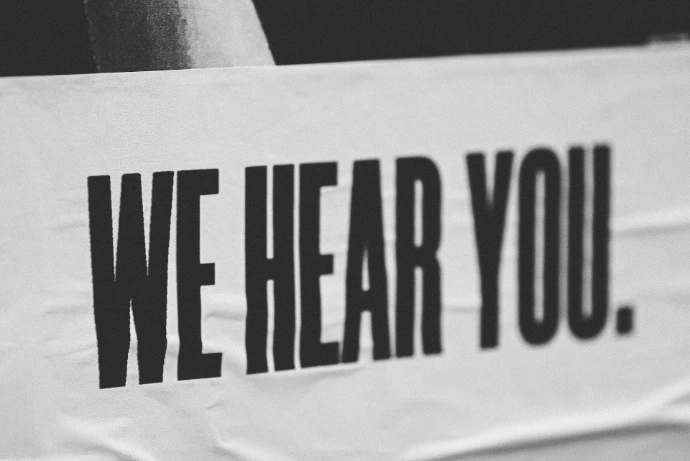 banner reading we hear you